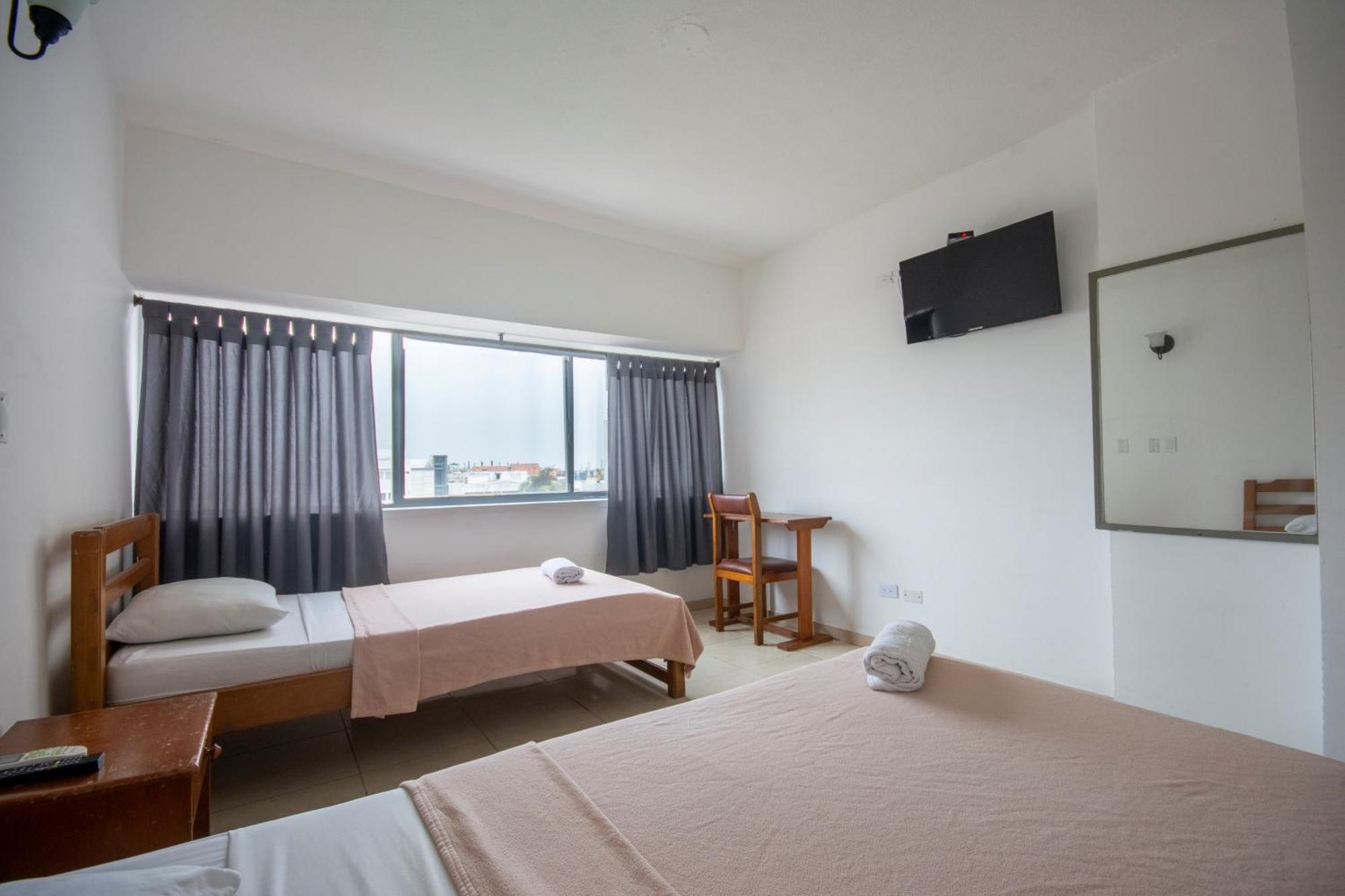 Quarto com 2 Camas de Solteiro