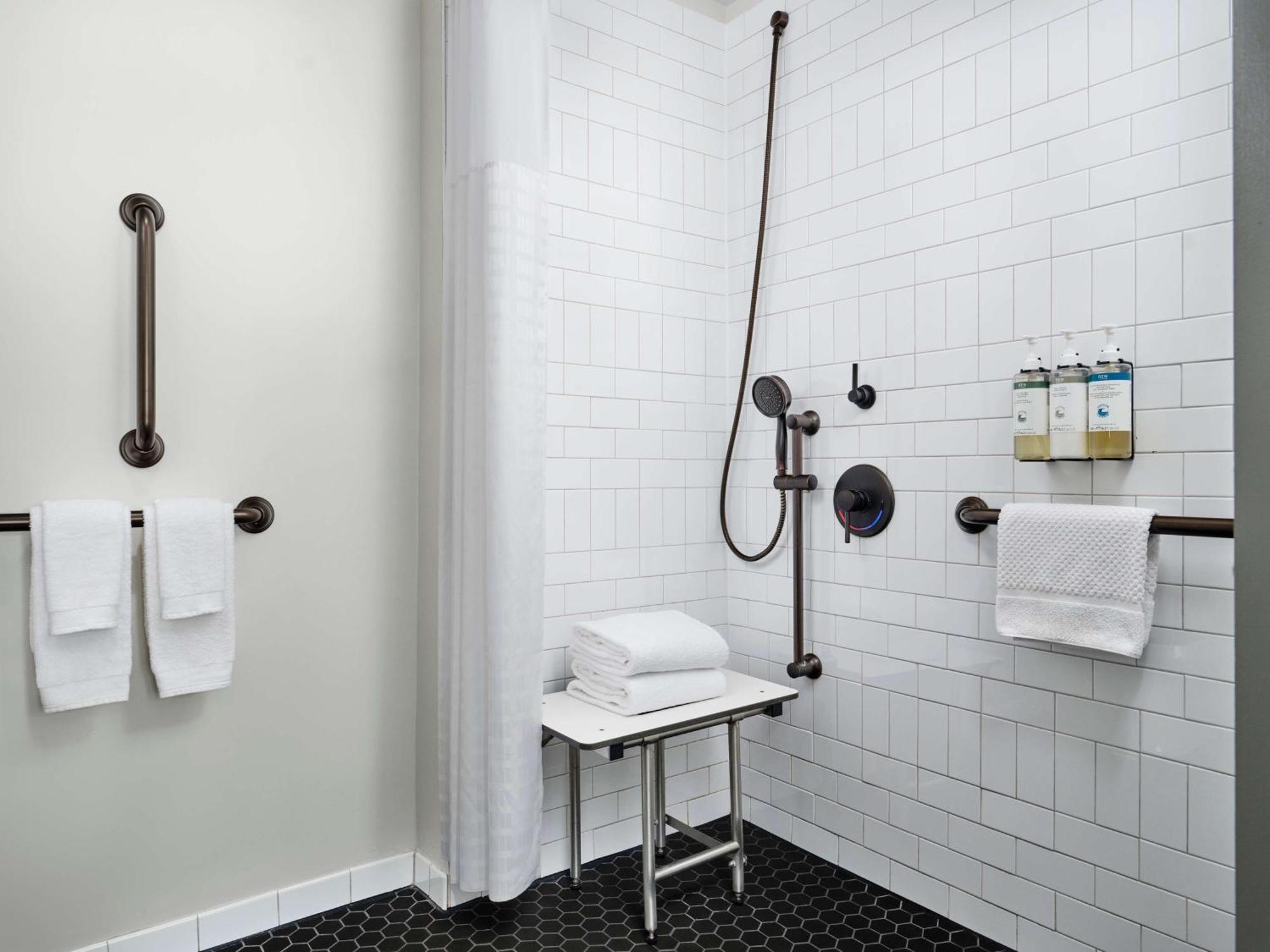 Deluxe King Room Roll Shower Mobility Accessible