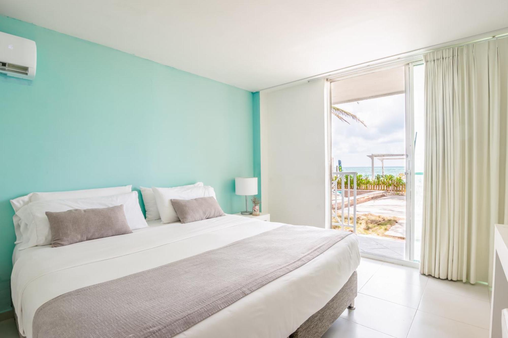 Quarto com Cama Queen-size e Vista do Mar