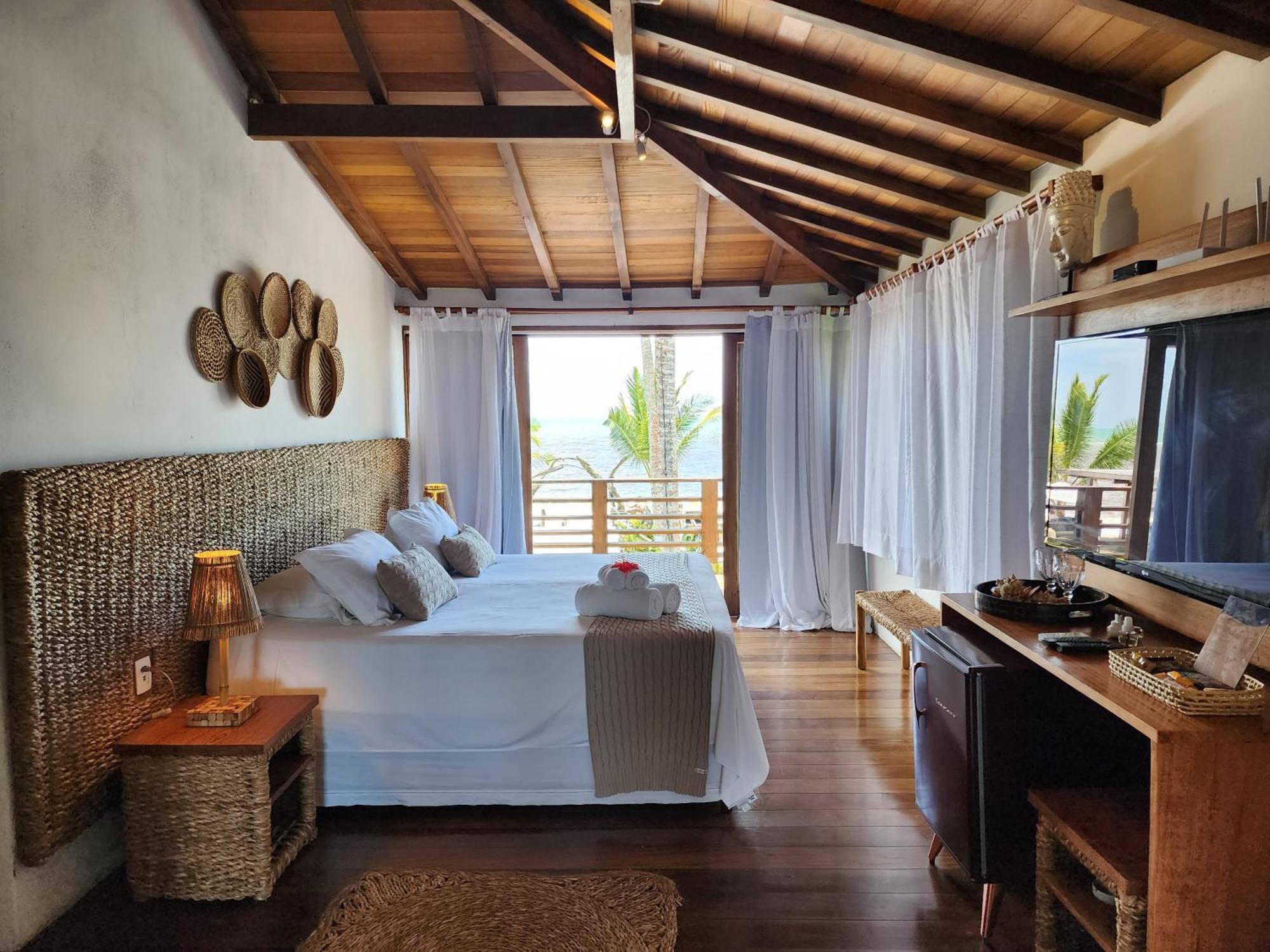 Quarto Quádruplo com Vista do Mar.