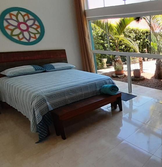 Suíte com Vista do Jardim