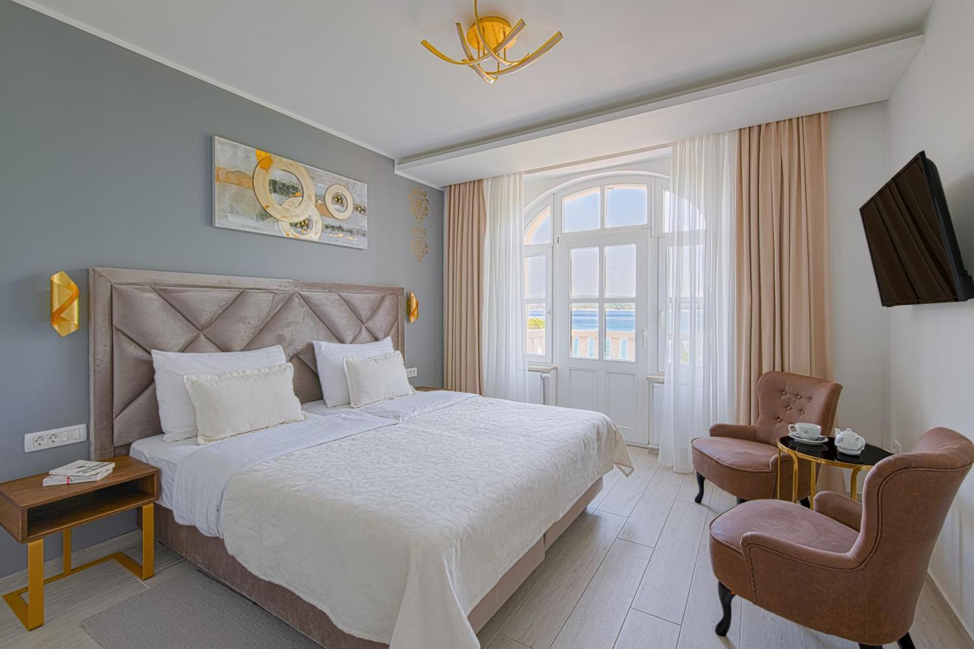Deluxe Familienzimmer mit Meerblick und Balkon