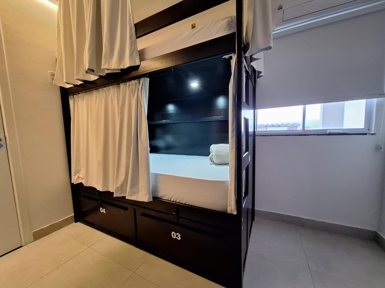Cama em Beliche num Dormitório Misto