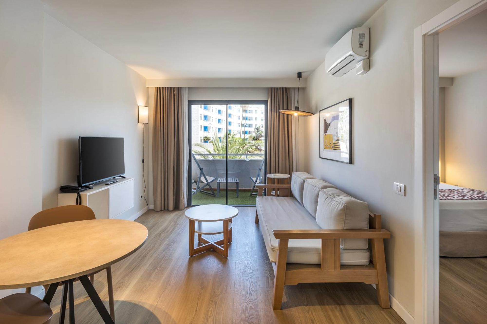 Habitación Doble con zona de cocina (2 adultos + 1 niño)