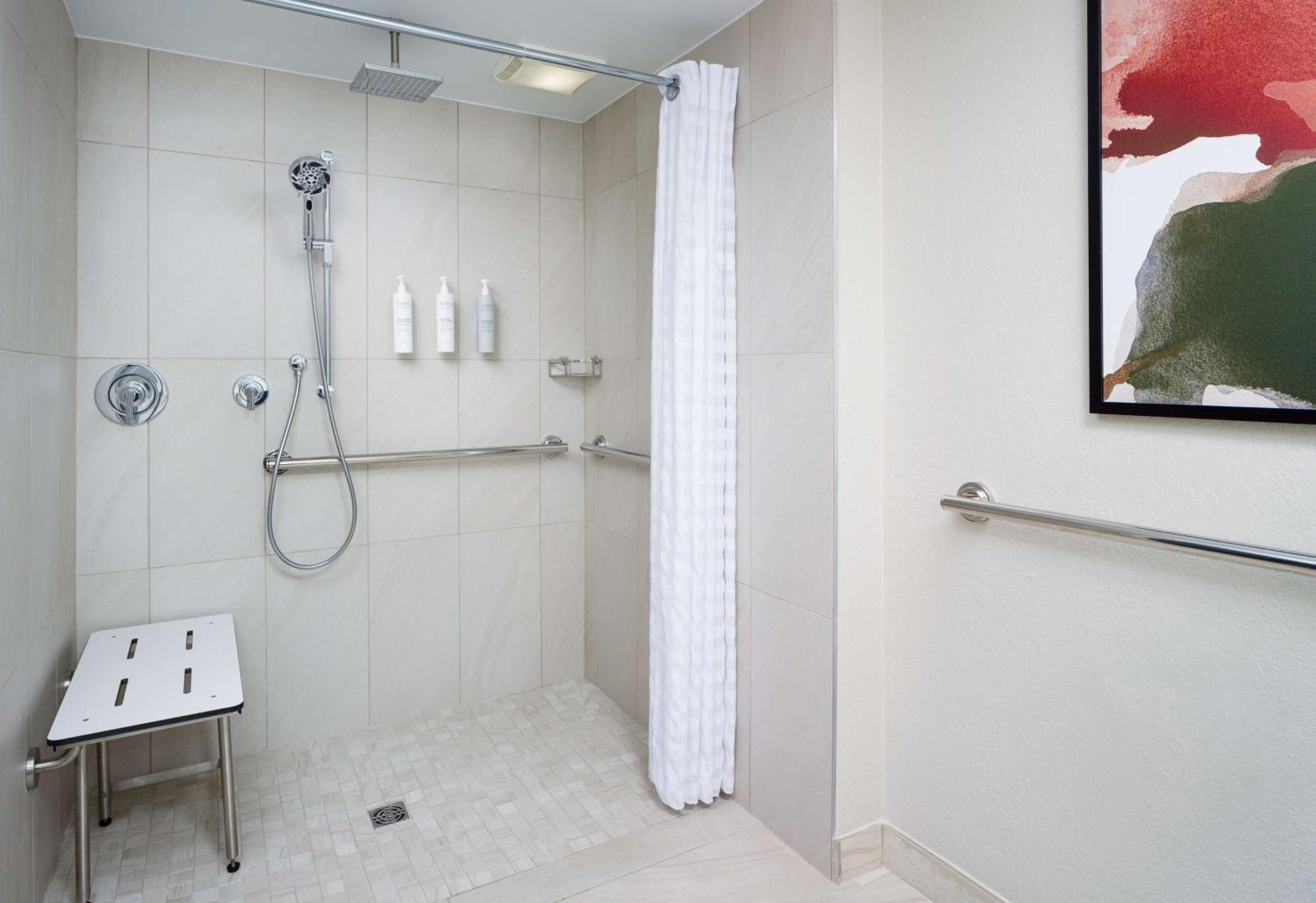 Two-Room King Suite Roll Shower Mobility Accessible