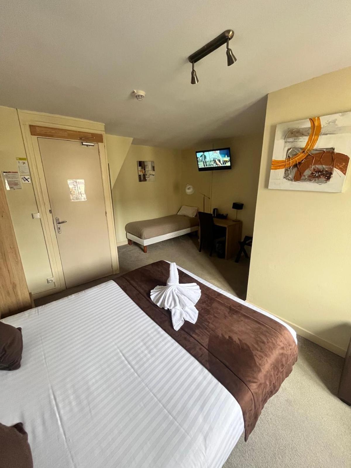 Chambre Triple - Vue sur Ville