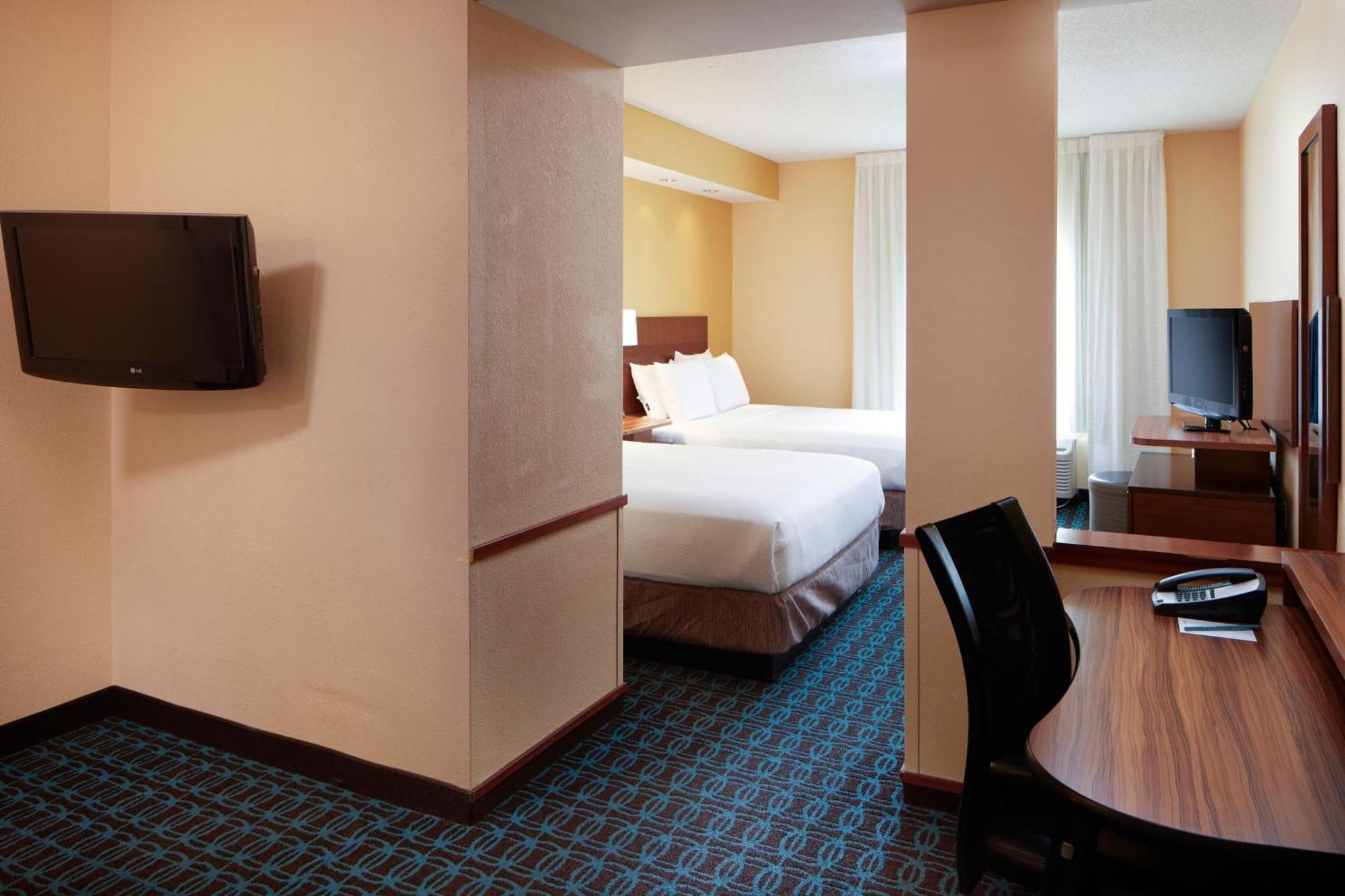 Queen Suite with Two Queen Beds and Sofa Bed