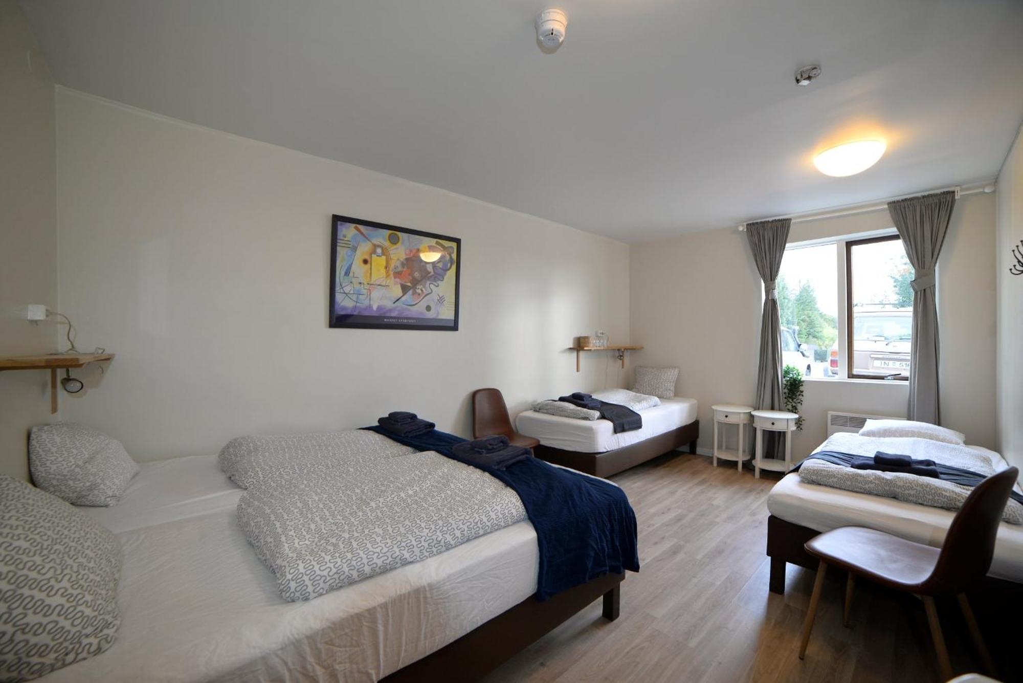 Chambre Quadruple avec Salle de Bains Commune