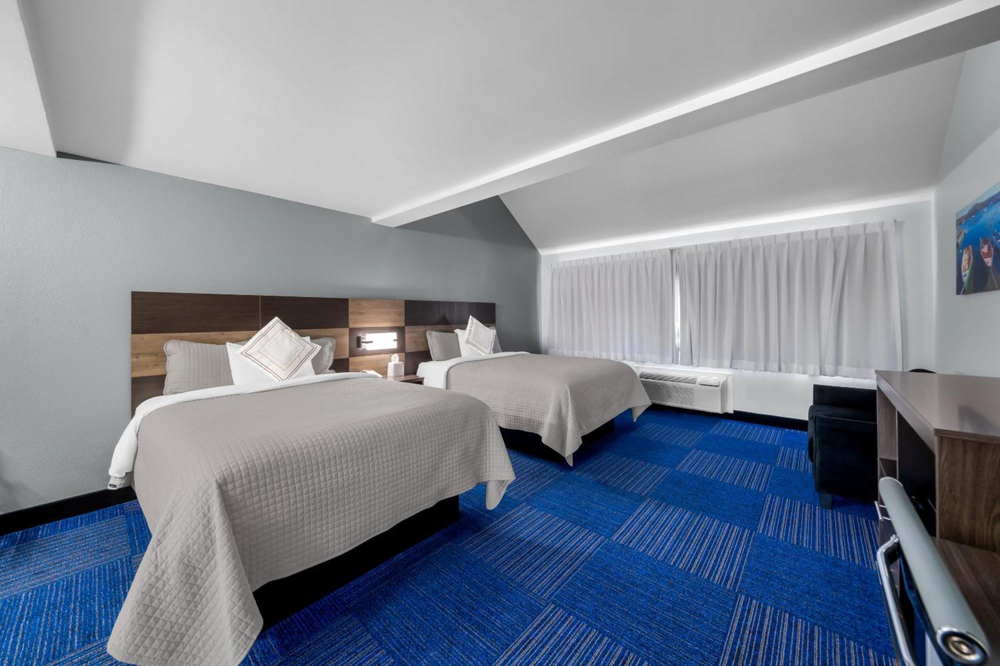 Townhouse Suite with One King and Two Queen Beds Smoke Free