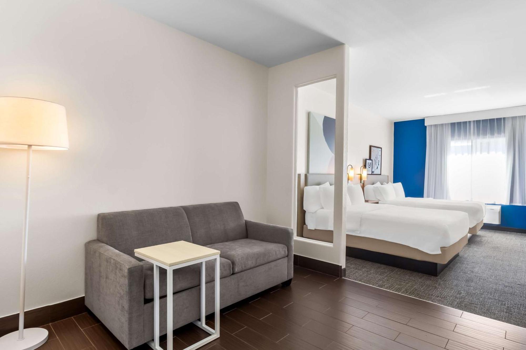Queen Room with Two Queen Beds and Sofa Bed