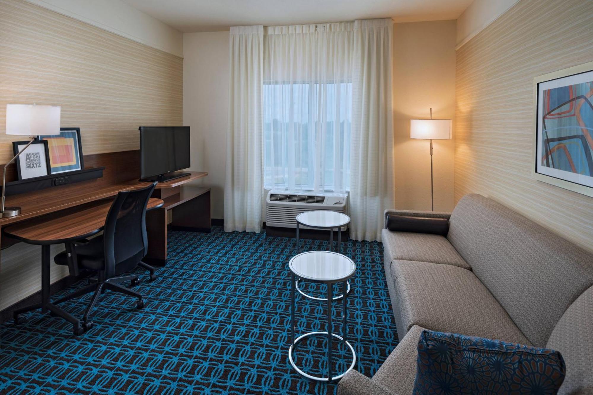 Queen Suite with Two Queen Beds and Sofa Bed