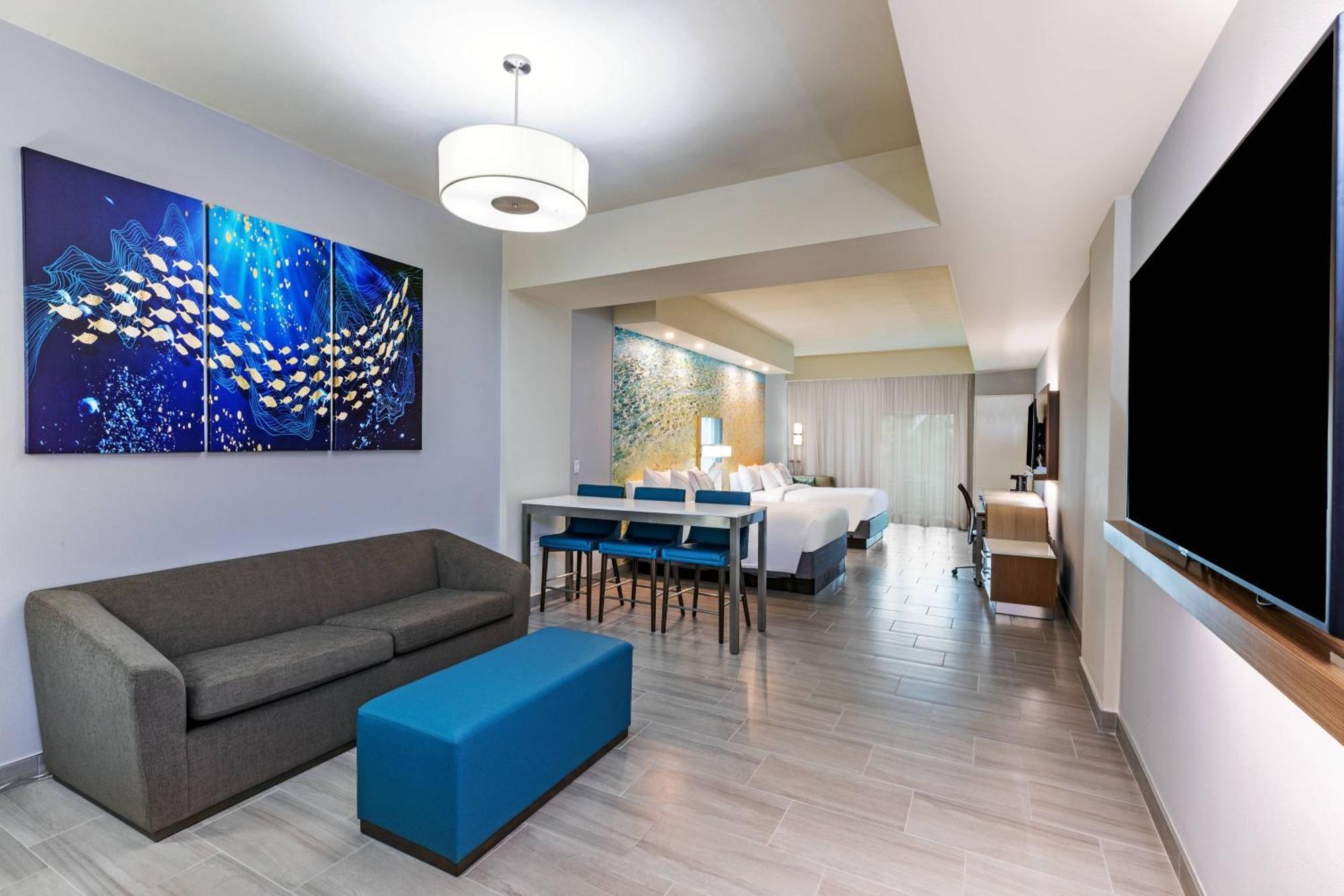 Queen Suite with Two Queen Beds and Sofa Bed