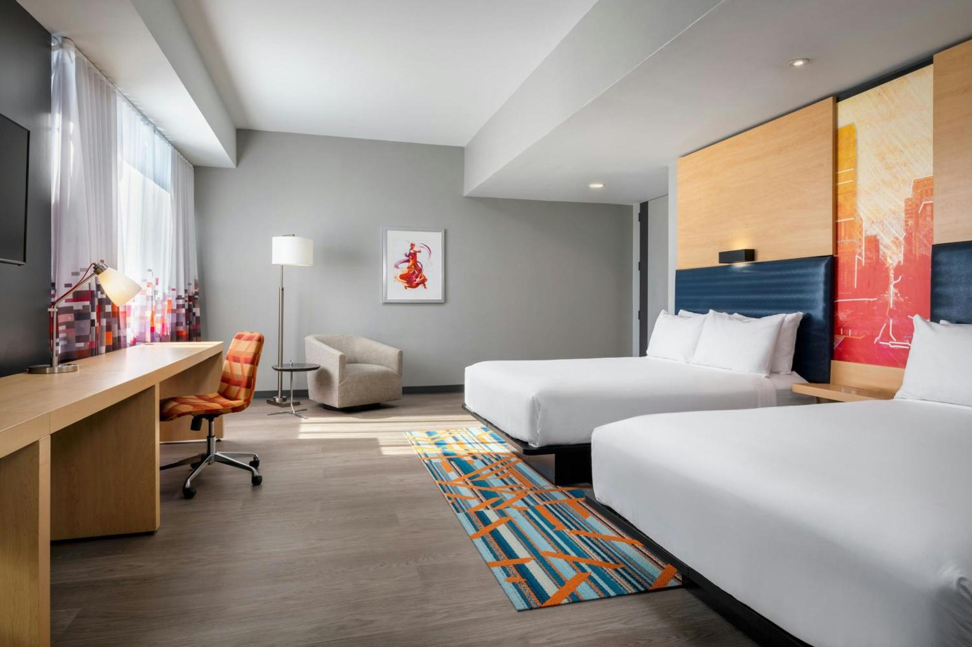 Corner Queen Room with City View and Roll-In Shower - Mobility Accessible