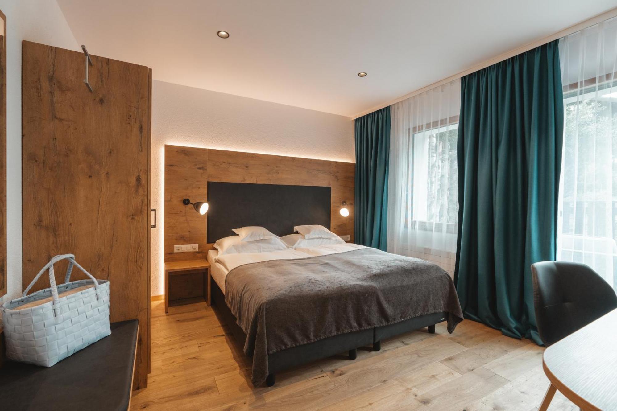 Familie Suite met 2 Slaapkamers en Tuinterras.