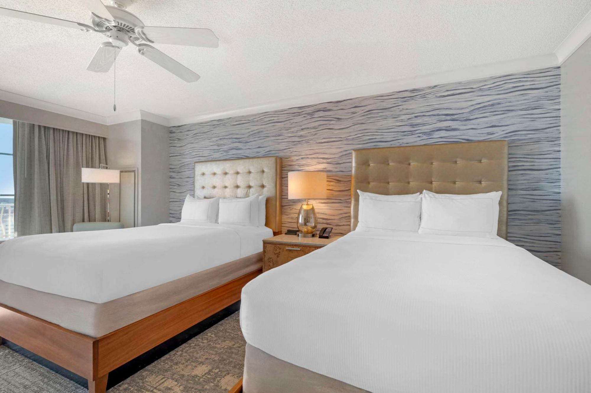 Superior Room Two Double Beds Balcony Partial Ocean View