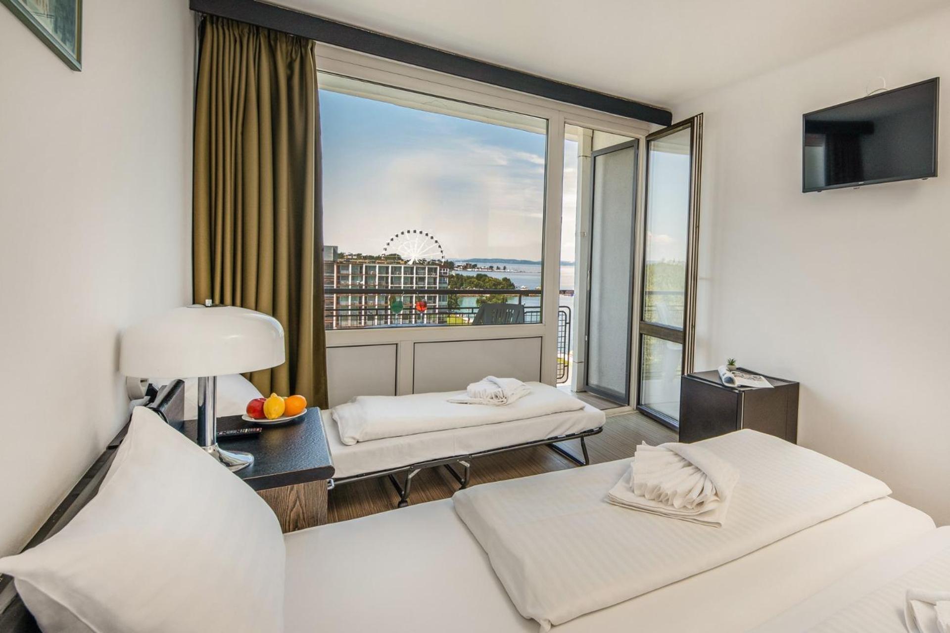 Familienzimmer (2 Erwachsene + 1 Kind) mit Balkon