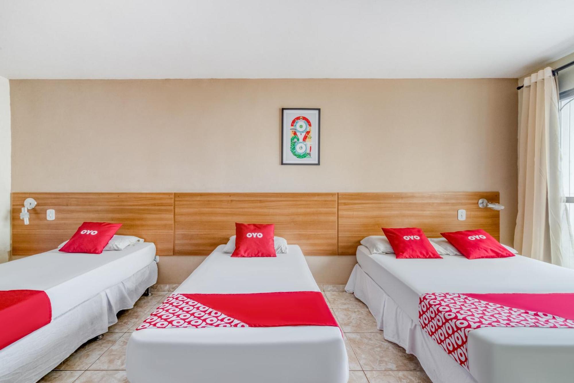 Quarto Quádruplo (1 Cama de Casal + 2 Camas Individuais)