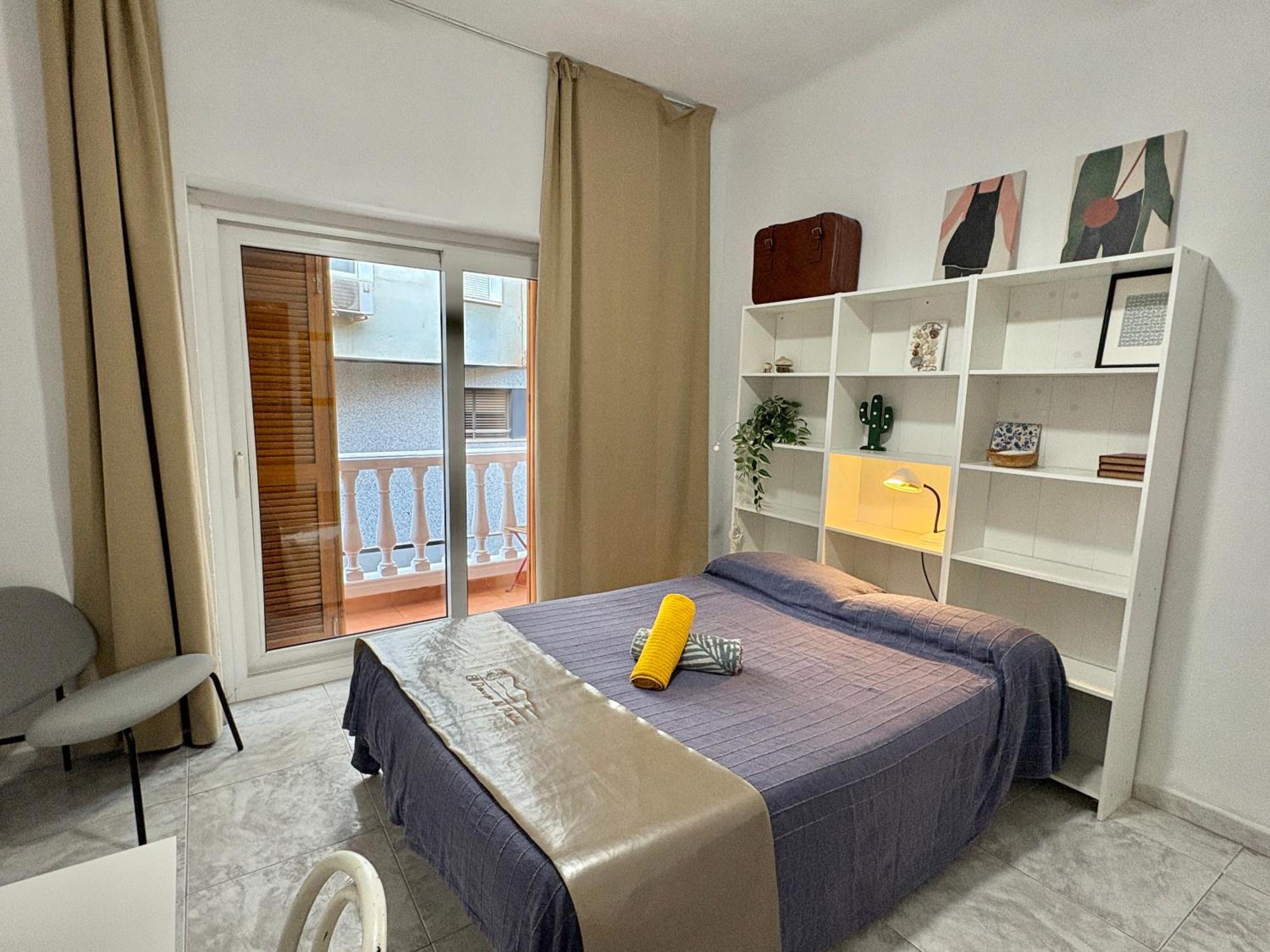 Tweepersoonskamer met Balkon en Gedeelde Badkamer