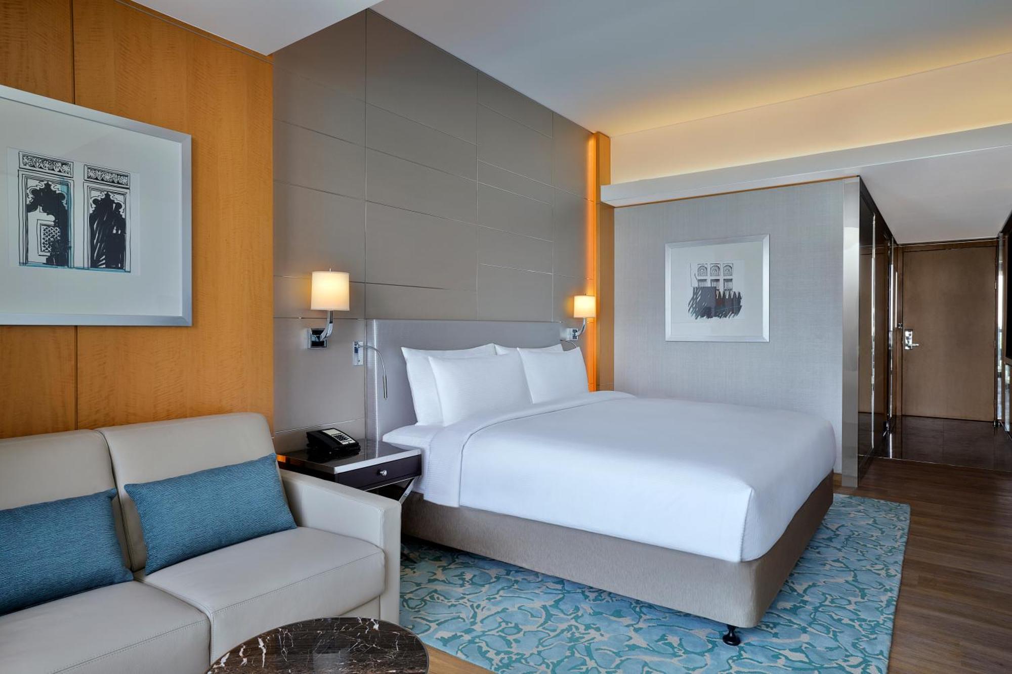 Chambre Lit King-Size Premium avec Balcon - Vue sur Mer