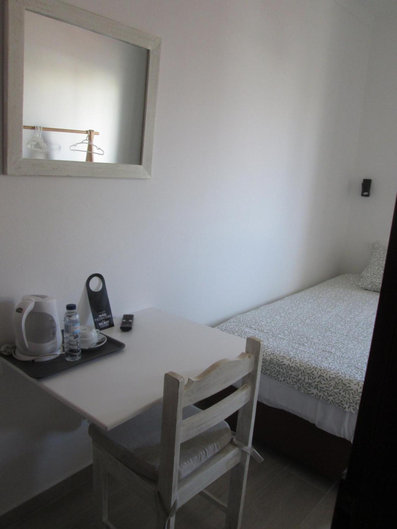 Quarto Individual com Casa de Banho Privativa