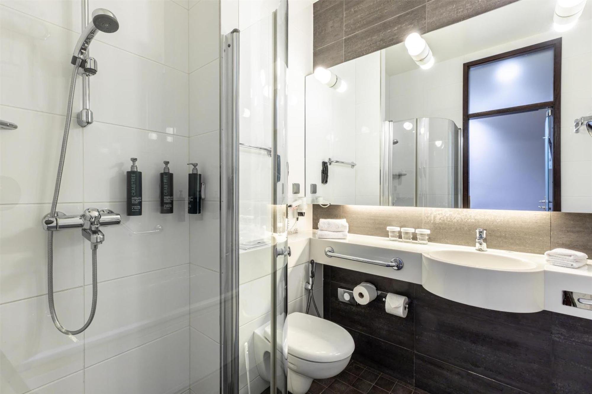 Kamer met 2 Aparte Bedden een Balkon