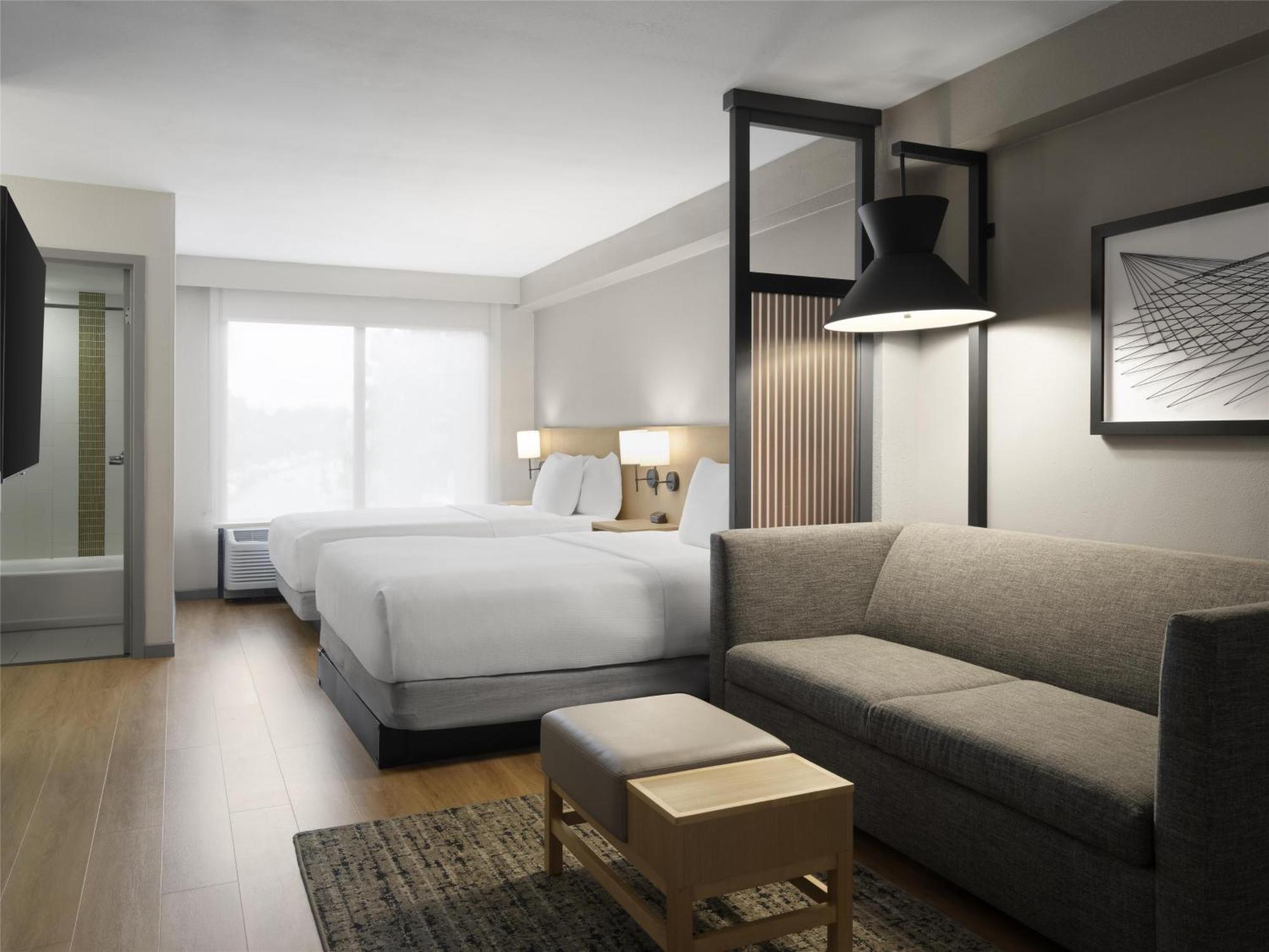 Queen Room with Two Queen Beds and Sofa Bed