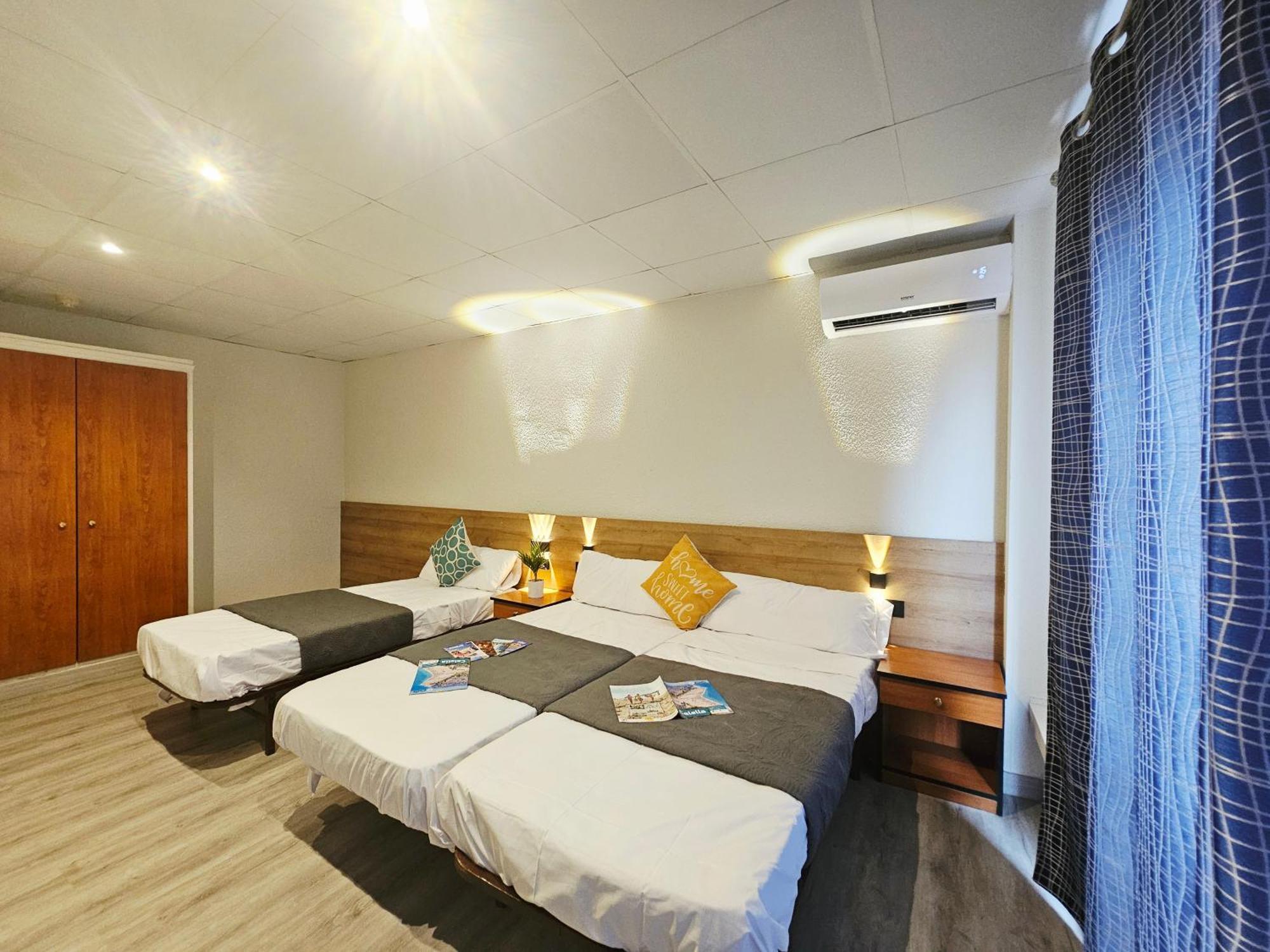 Chambre Triple avec Salle de Bains Privative