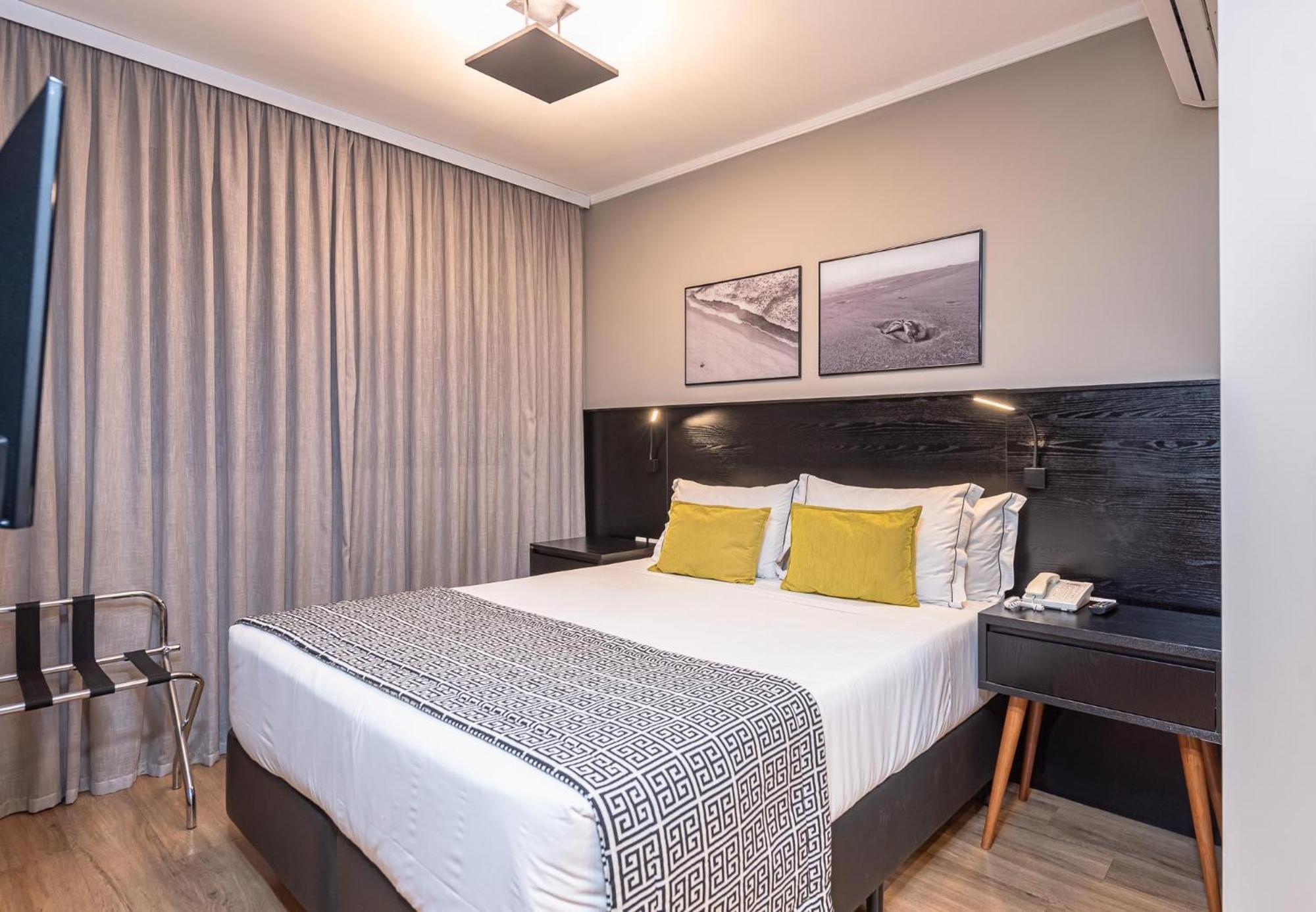 Quarto Triplo Executivo com Cama Queen-size