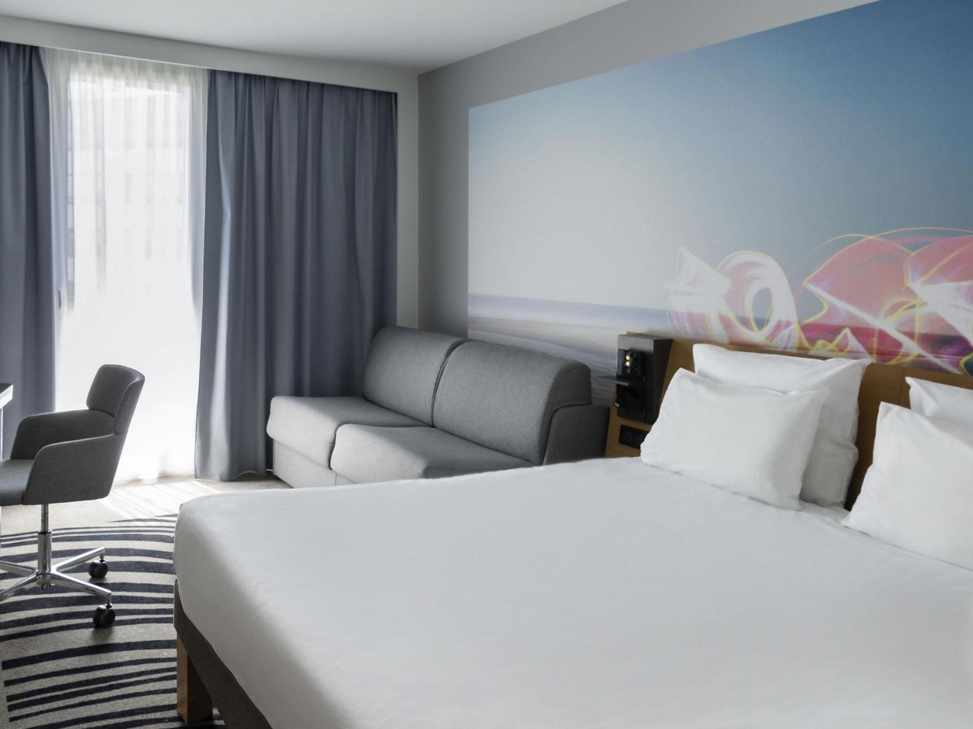 Chambre Exécutive avec 1 Lit Double et 1 Canapé