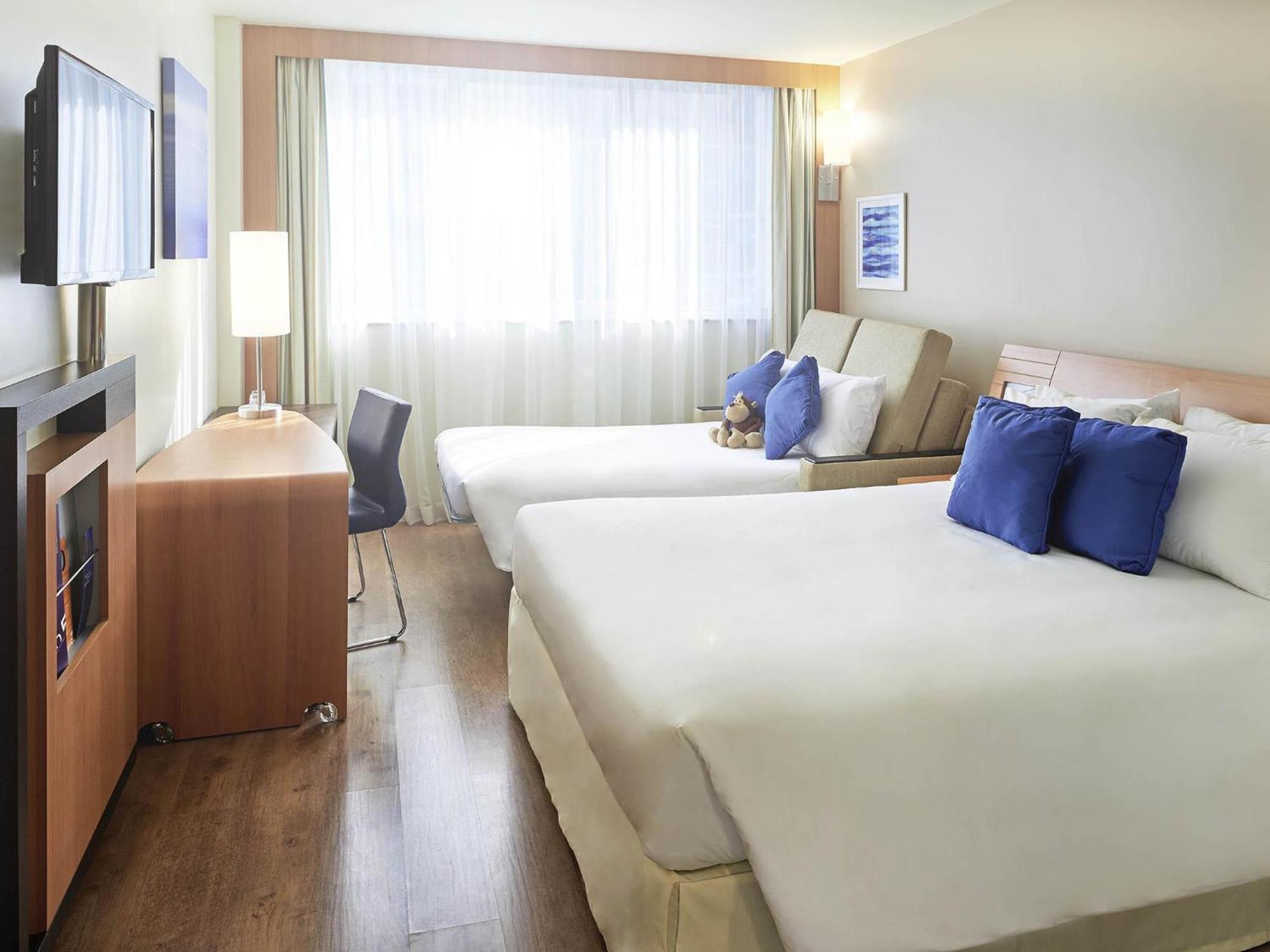 Quarto Triplo Deluxe com Vista Mar