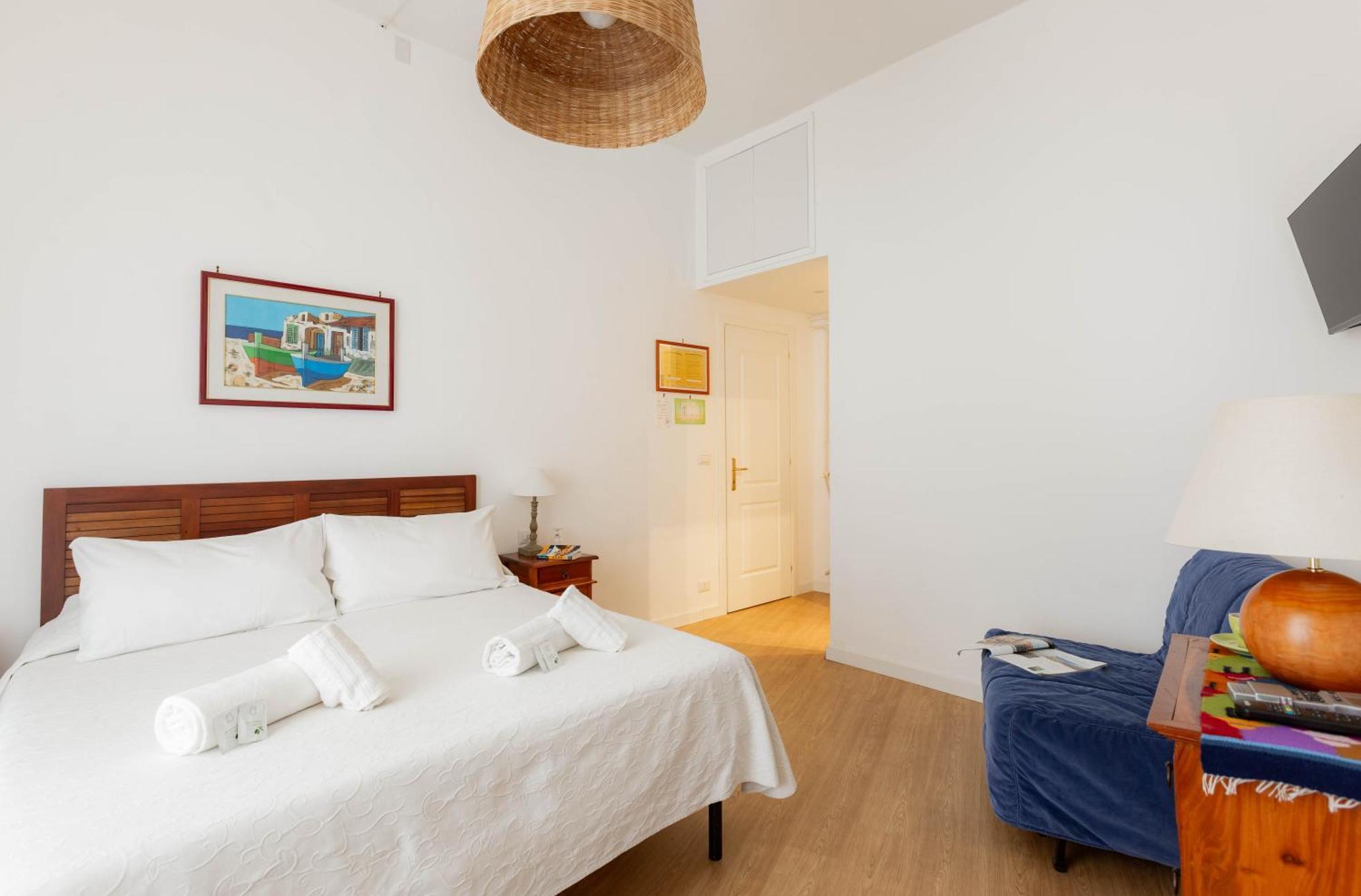 Quarto Triplo com Casa de Banho Privativa