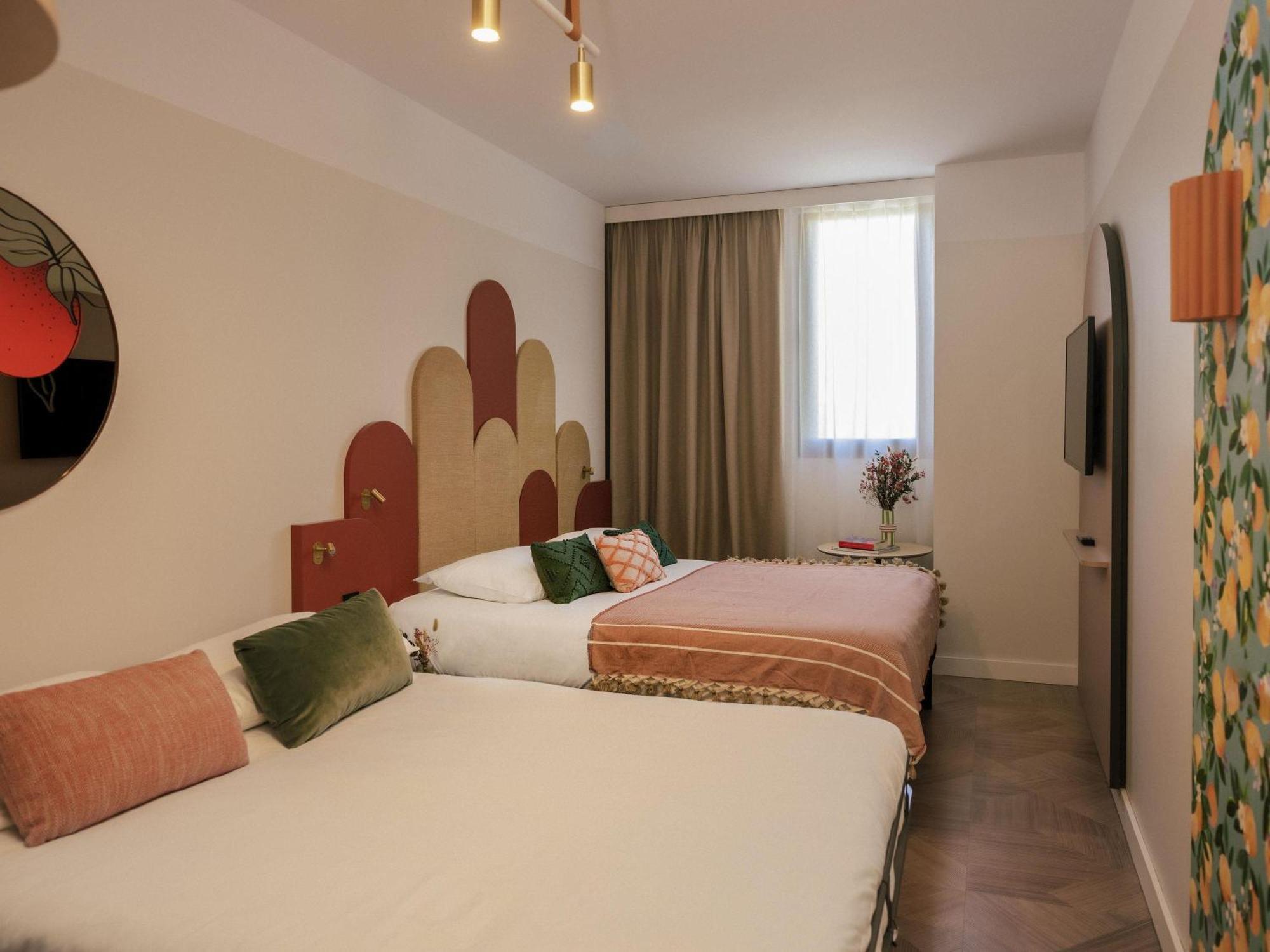 Familiekamer met Tweepersoonsbed en Slaapbank