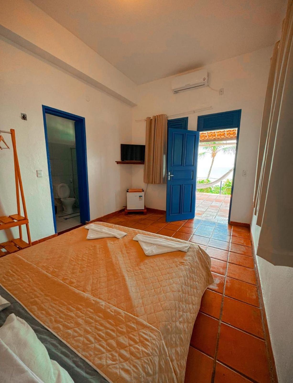 Quarto Duplo com Varanda e Vista do Mar