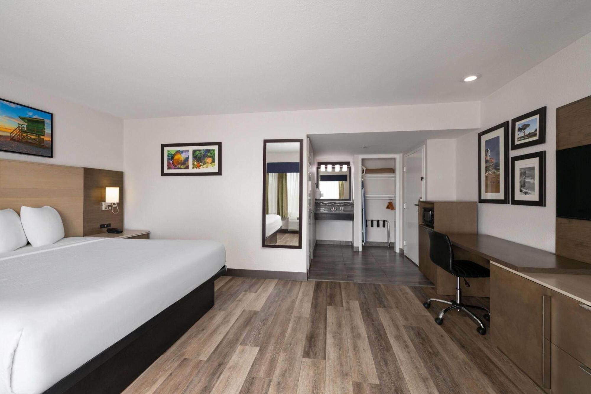 Quarto com 1 Cama King-size Acessível para Hóspedes com Mobilidade/Capacidade Auditiva Reduzida - Não Fumantes