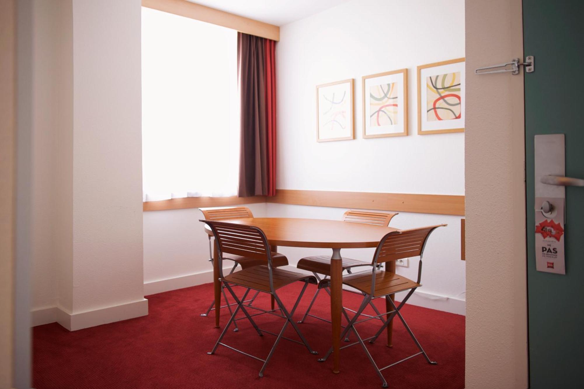 Suite met 1 Tweepersoonsbed en Slaapbank