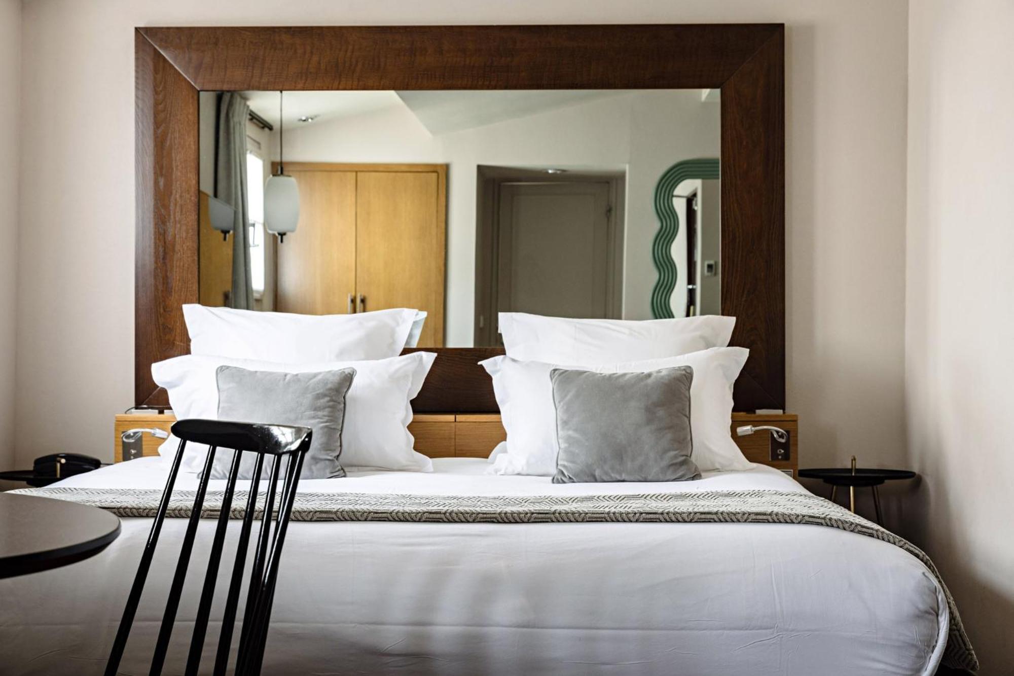 Quarto King Premium com Sofá-cama