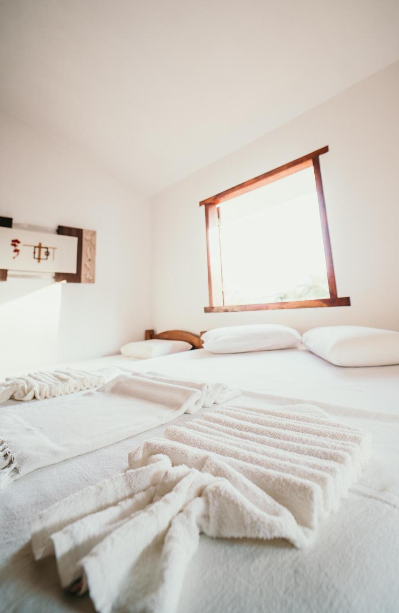 Quarto Triplo com Varanda
