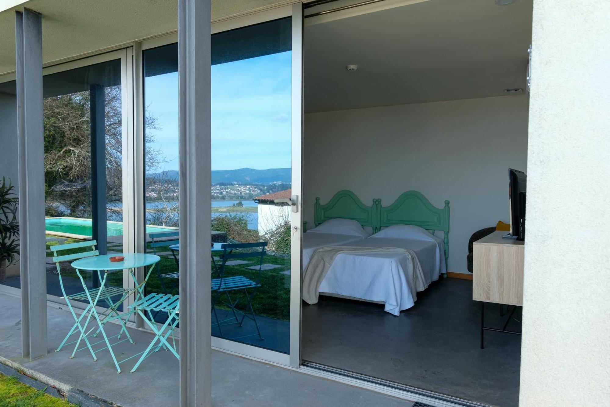 Quarto Duplo ou Twin Deluxe com Vista Piscina