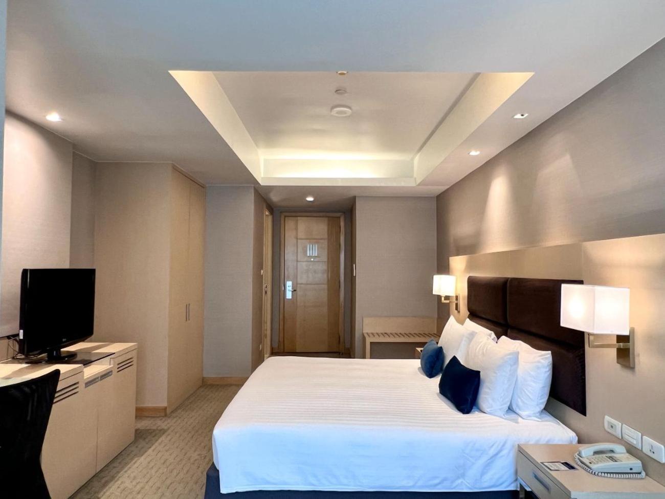 Chambre Lit King-Size Deluxe - Vue sur Ville