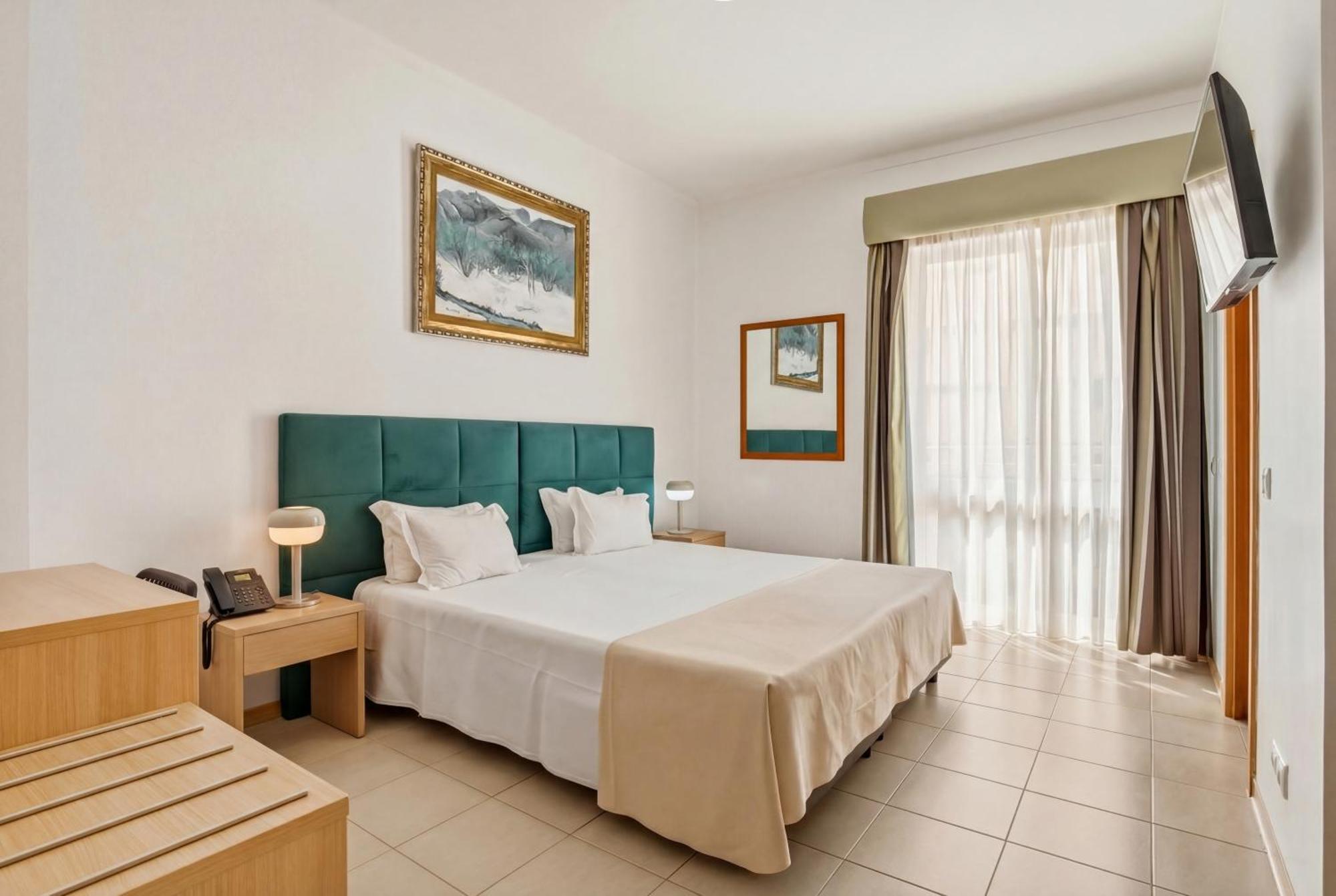 Quarto Duplo ou Twin com Vista Mar Lateral