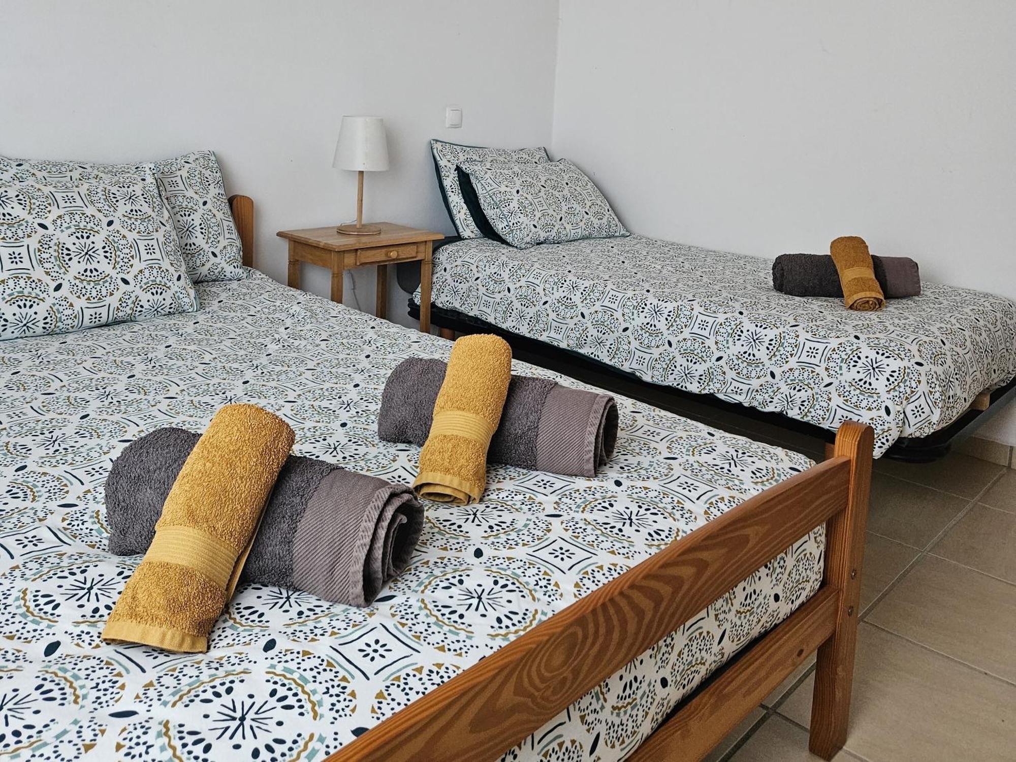 Quarto Triplo com Casa de Banho Partilhada