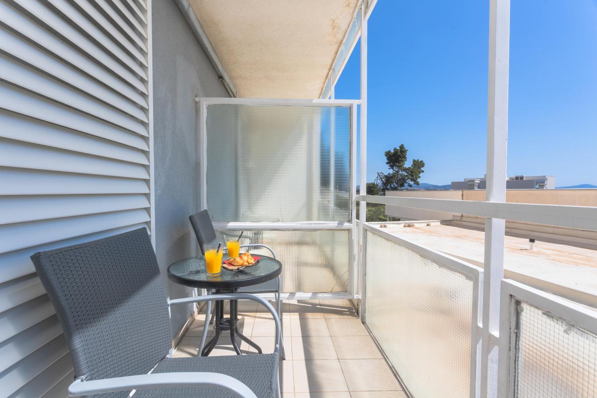 Economy Tweepersoonskamer met 2 Aparte Bedden en Balkon