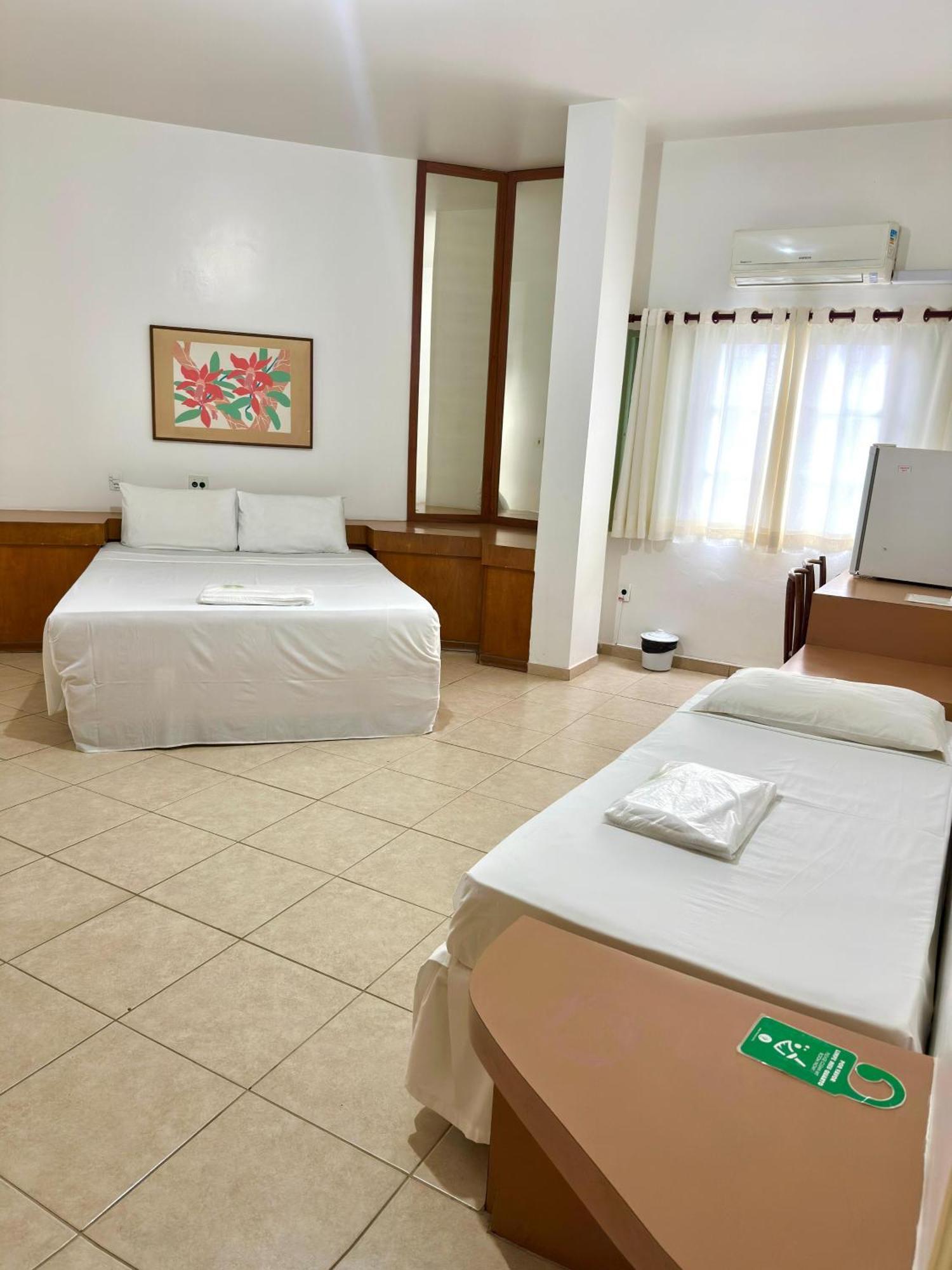 Quarto Triplo Executivo
