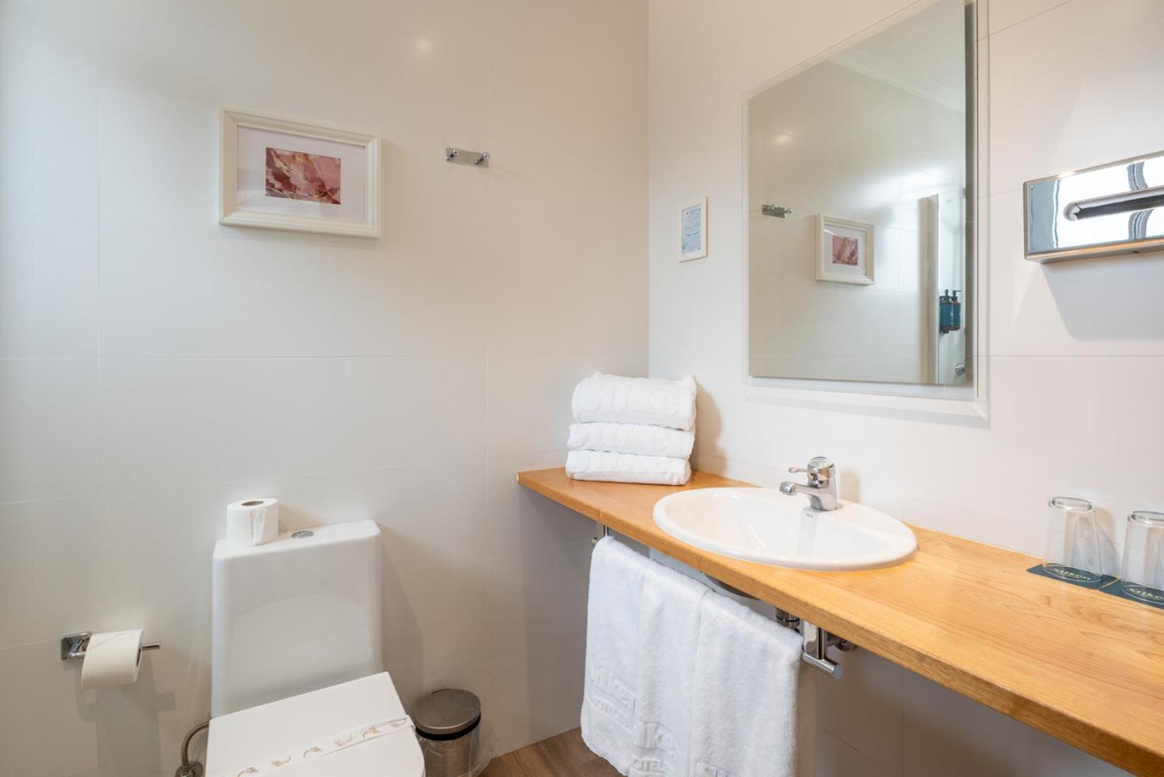 Habitación doble económica con cama supletoria - Edificio anexo