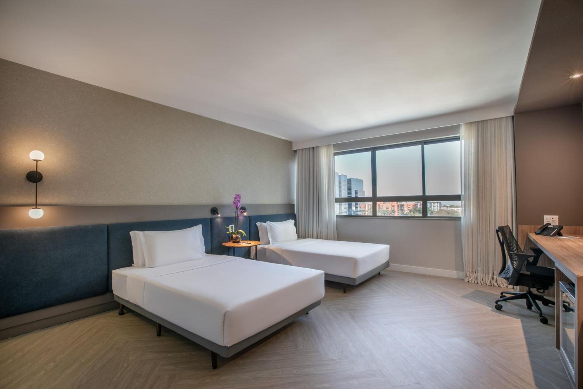 Quarto Premium com 2 Camas de Solteiro