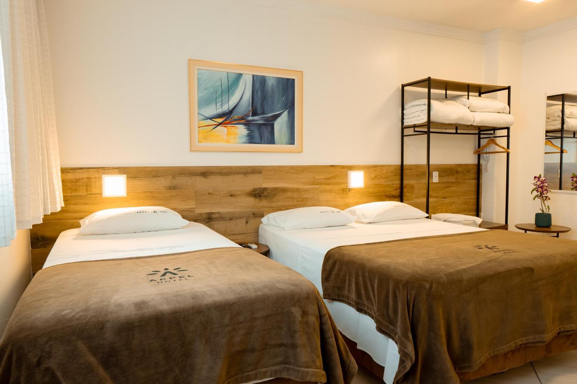 Quarto Triplo Executivo