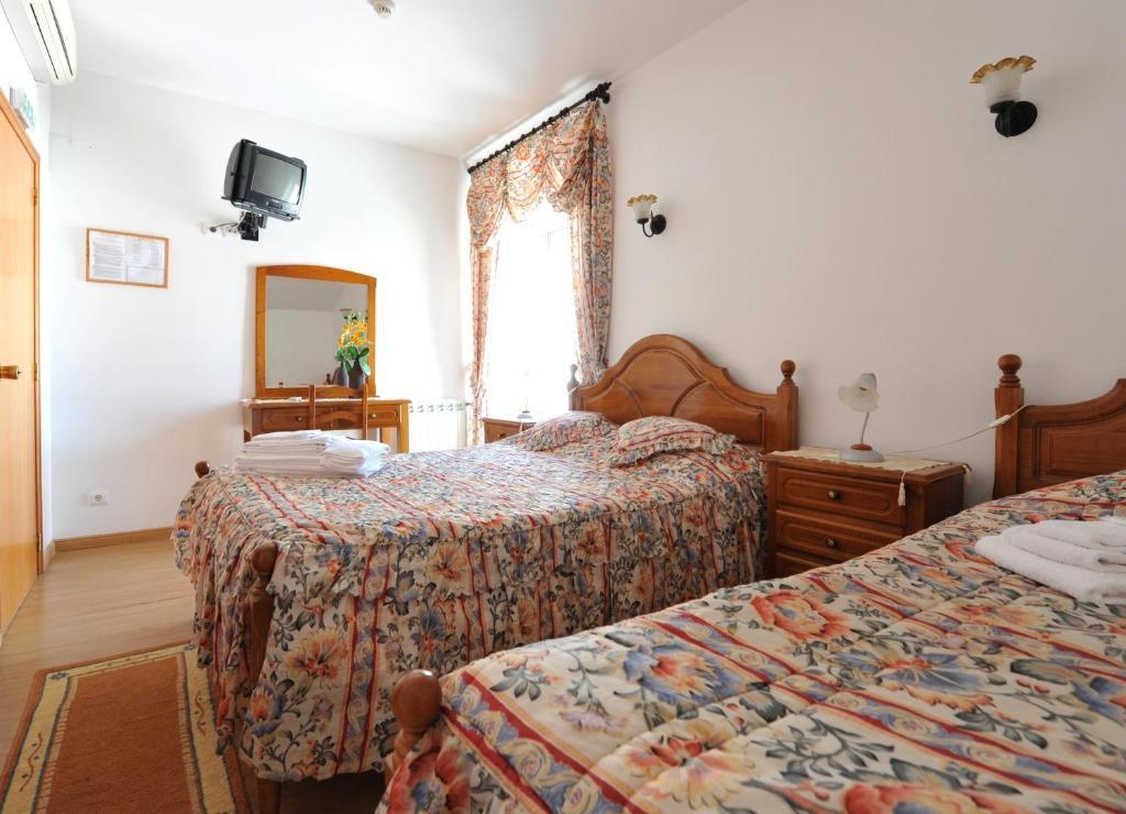 Quarto Duplo com Cama Extra