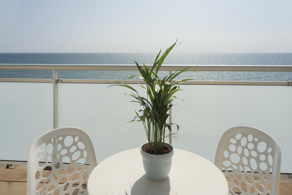 Habitación Cuádruple con vistas al mar (2 adultos + 2 niños)