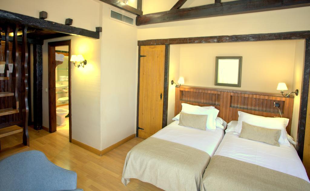 Habitación Cuádruple Dúplex (3 adultos + 1 niño)