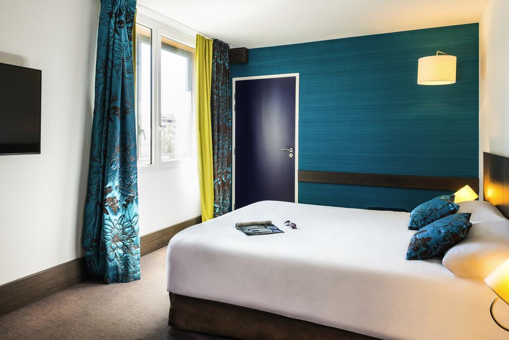 Junior Suite met Queensize Bed en Slaapbank